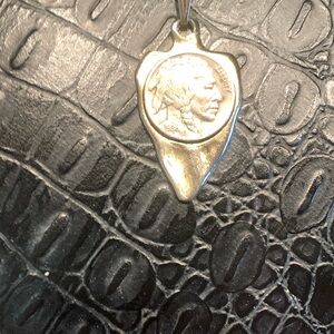 Silver gold toned arrowhead design